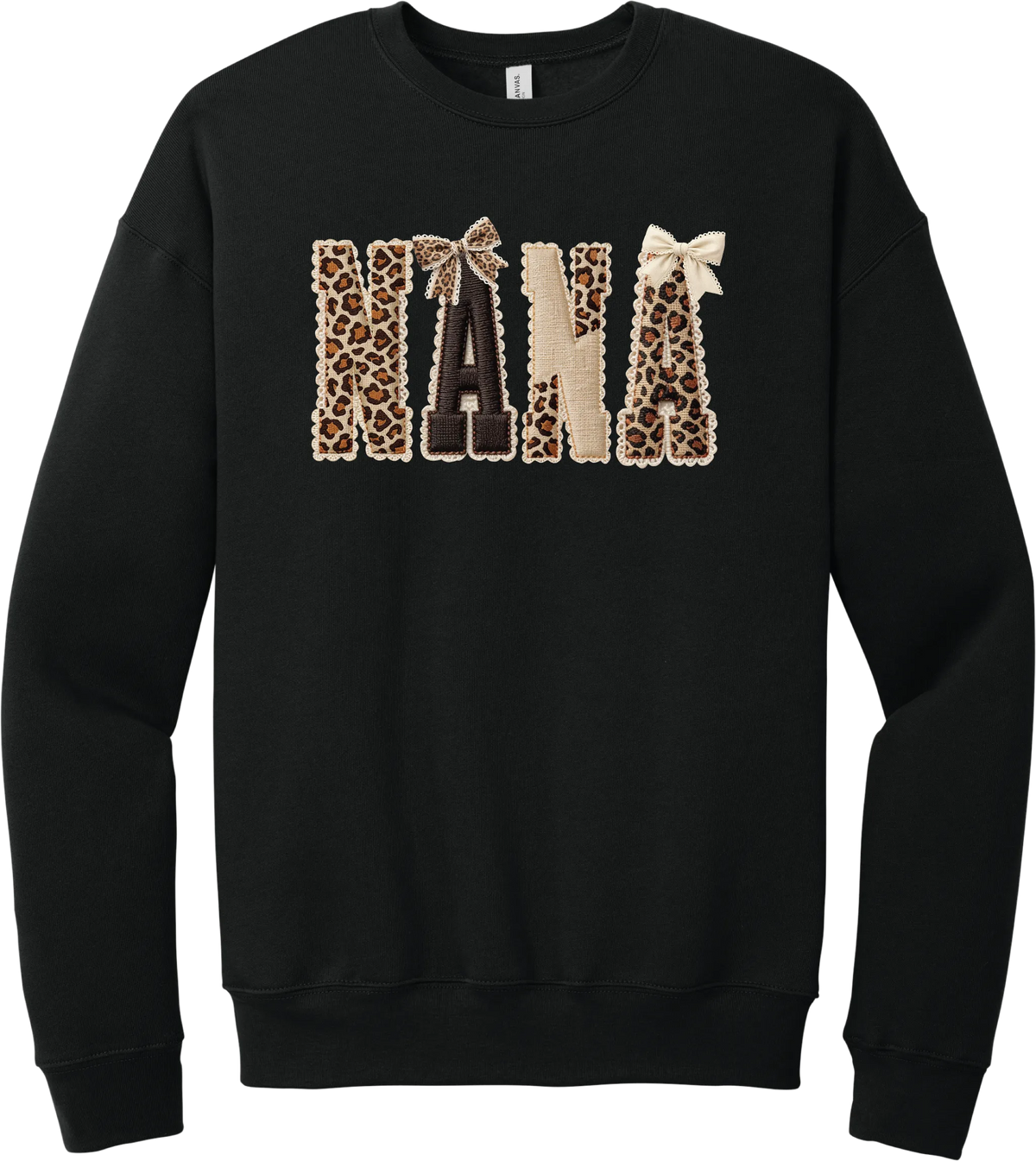 Grandma Leopard Applique crewneck sweatshirt in Black, featuring NANA spelled out in leopard, cream, and chocolate patches with a scalloped stitched applique look and two bows