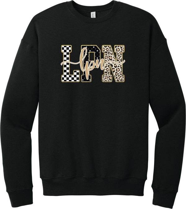 Glitzy Patterned LPN crewneck sweatshirt in Black, featuring LPN block letters in checkerboard, sparkle star, and leopard patterns with a gold glitter outline and lpn script