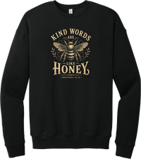 Kind Words Honey Bee crewneck sweatshirt in Black, featuring Kind Words Are Like Honey in arched vintage lettering around a golden honey bee and honeycomb with Proverbs 16:24