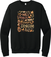 Praise Him Wildflower crewneck sweatshirt in Black, featuring I Will Praise Him in Every Season in hand lettering surrounded by fall wildflowers, pumpkins, a latte, boots, and Psalm 146:2