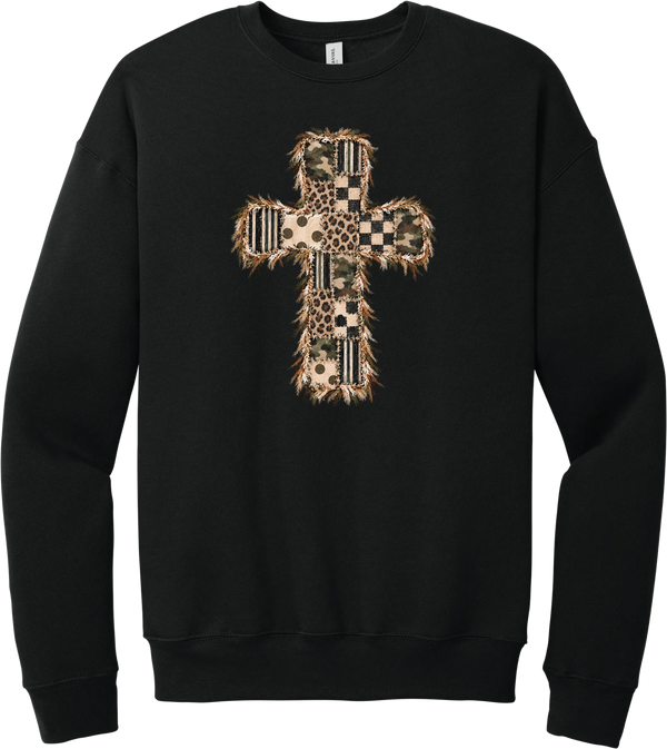 Quilted Patchwork Cross crewneck sweatshirt in Black, featuring a patchwork cross in camo, leopard, checkerboard, polka dot, and stripes with a fringed edge