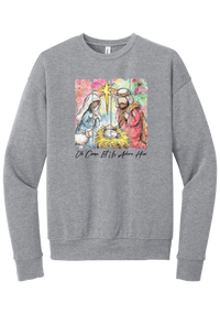 Adore Him Painted Nativity crewneck sweatshirt in Athletic Heather, featuring a watercolor nativity of Mary, Joseph, and baby Jesus under a star with Oh Come Let Us Adore Him script
