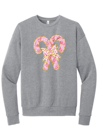 Candy Cane Bow crewneck sweatshirt in Athletic Heather, featuring two pink glitter candy canes tied with a leopard heart bow and gold trim