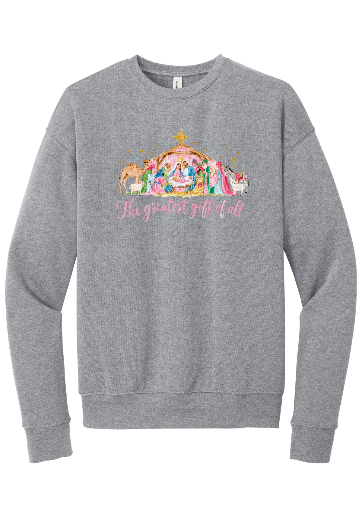 The Greatest Gift of All crewneck sweatshirt in Athletic Heather, featuring a pastel watercolor nativity scene under the star with The Greatest Gift of All script and Matthew 1:21