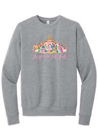The Greatest Gift of All crewneck sweatshirt in Athletic Heather, featuring a pastel watercolor nativity scene under the star with The Greatest Gift of All script and Matthew 1:21
