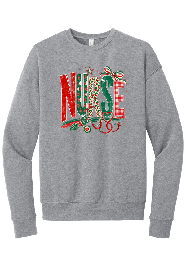 Holiday Nurse Stethoscope crewneck sweatshirt in Athletic Heather, featuring patterned NURSE letters in red and green argyle, leopard, and gingham with a striped bow, holly, and a red heart stethoscope