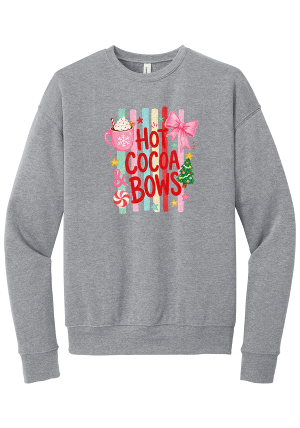 Hot Cocoa and Bows crewneck sweatshirt in Athletic Heather, featuring red HOT COCOA and BOWS letters on pastel stripes with a cocoa mug and a pink bow