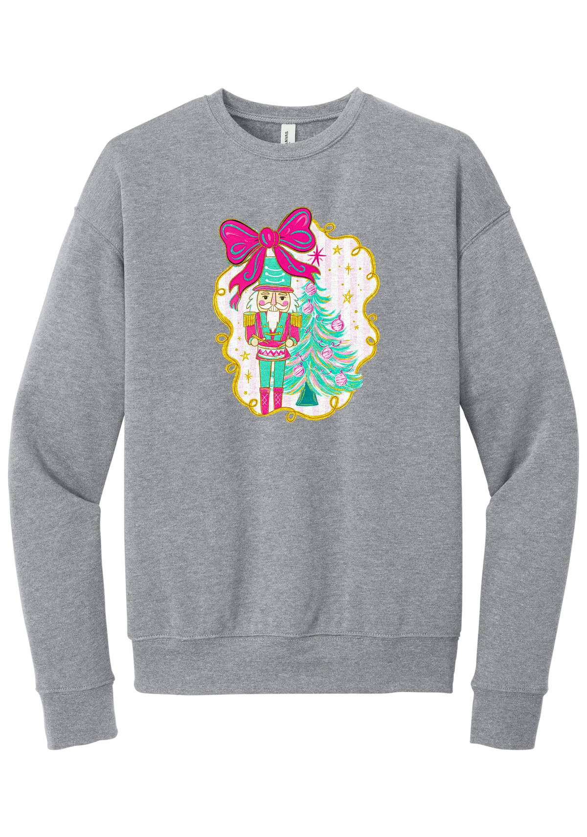 Nutcracker Bow crewneck sweatshirt in Athletic Heather, featuring a teal and pink nutcracker beside a tinsel tree under a big hot pink bow