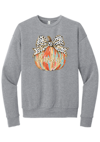 Thankful Pumpkin Bow crewneck sweatshirt in Athletic Heather, featuring a painted pumpkin with a spotted bow and thankful in gold glitter script
