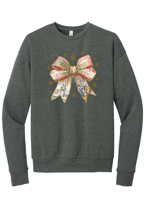 Nativity Bow crewneck sweatshirt in Deep Heather, featuring a blush satin bow with painted nativity scenes in its ribbons and gold snowflakes