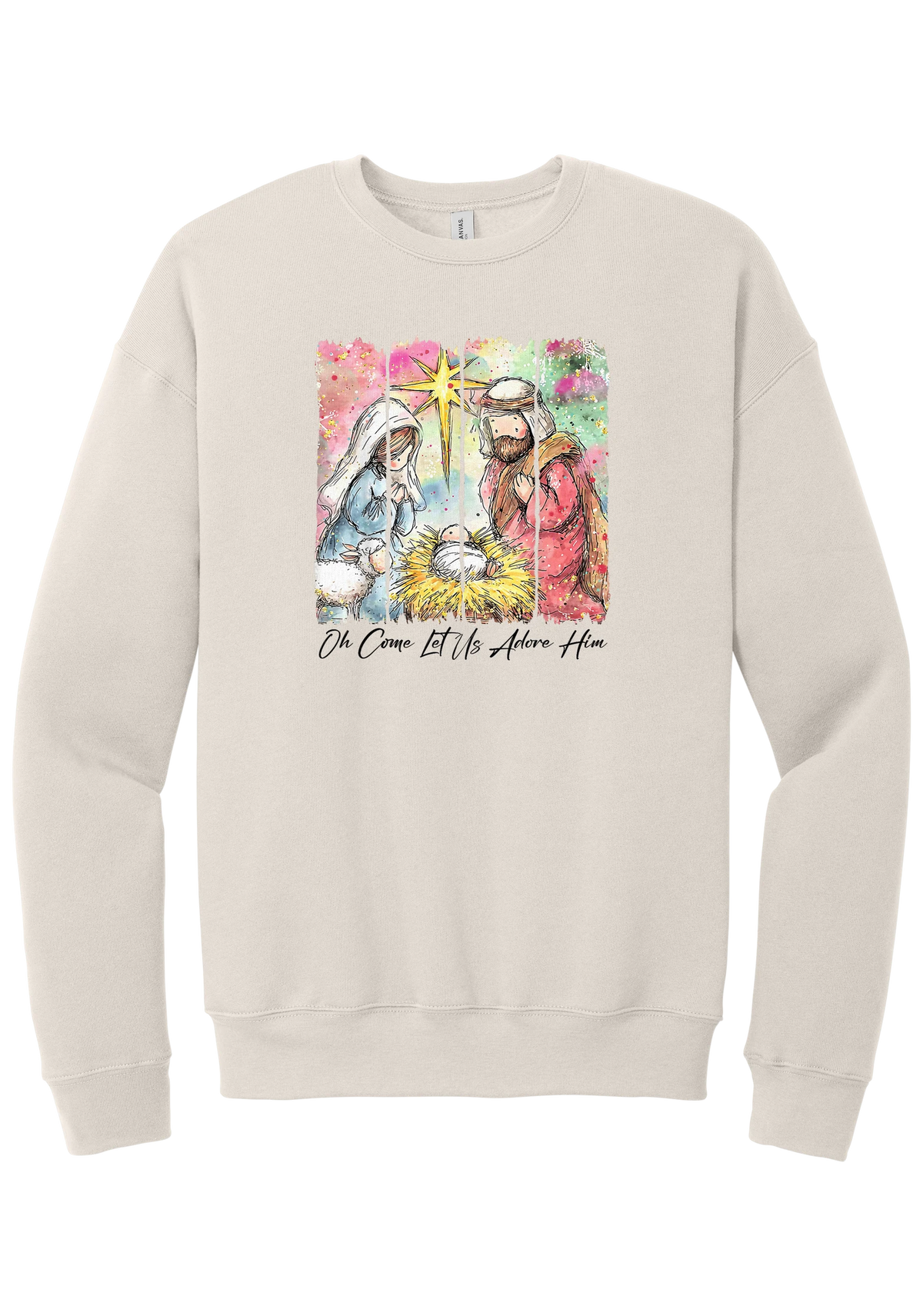Adore Him Painted Nativity crewneck sweatshirt in Heather Dust, featuring a watercolor nativity of Mary, Joseph, and baby Jesus under a star with Oh Come Let Us Adore Him script