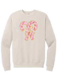 Candy Cane Bow crewneck sweatshirt in Heather Dust, featuring two pink glitter candy canes tied with a leopard heart bow and gold trim