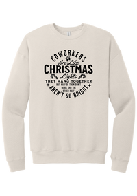 Coworkers Are Like Christmas Lights crewneck sweatshirt in Heather Dust, featuring bold black type reading Coworkers Are Like Christmas Lights, they hang together but half of them don't work and the other half aren't so bright