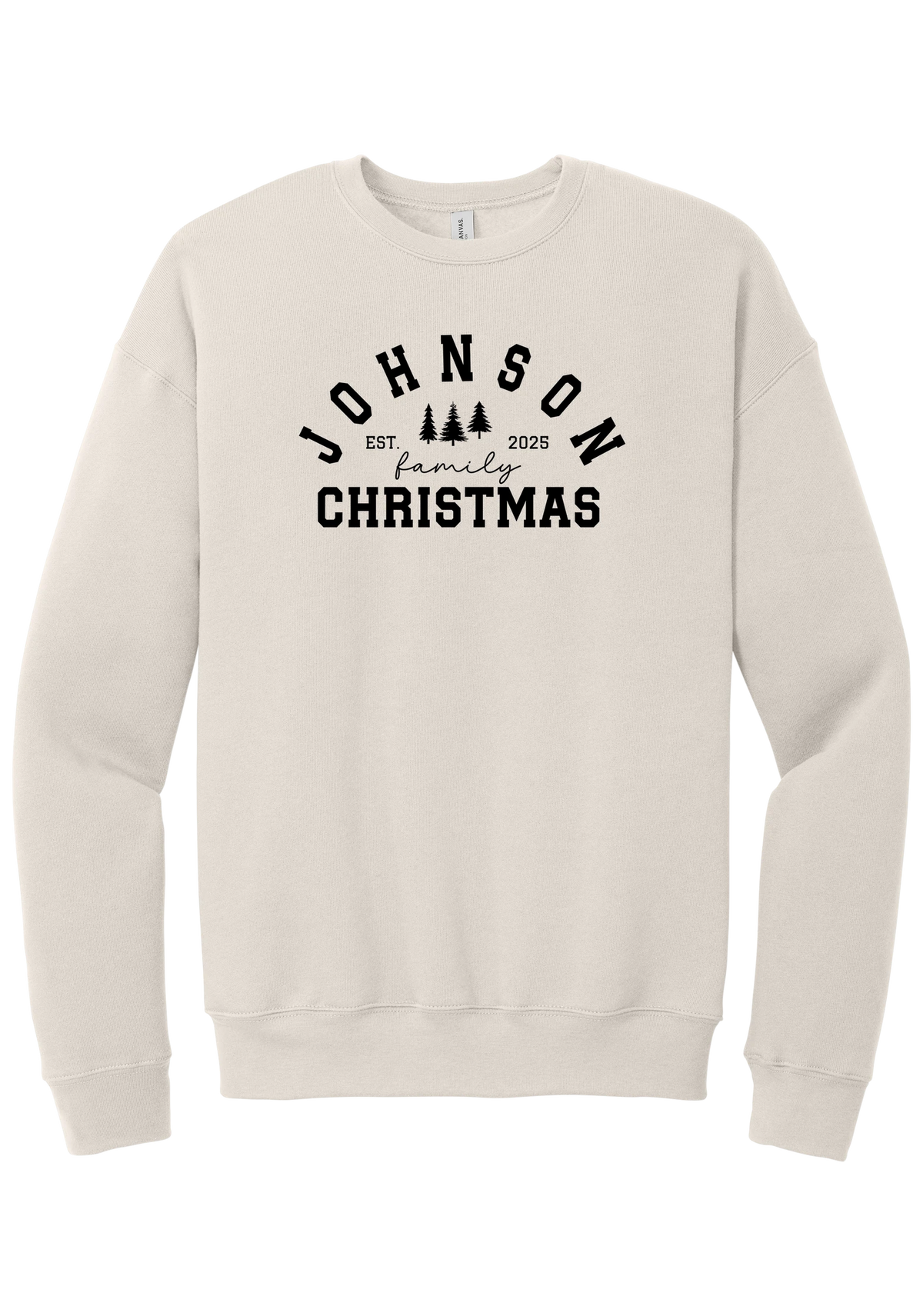 Personalized Family Christmas crewneck sweatshirt in Heather Dust, featuring an arched family name over pine trees with EST. year and family Christmas lettering