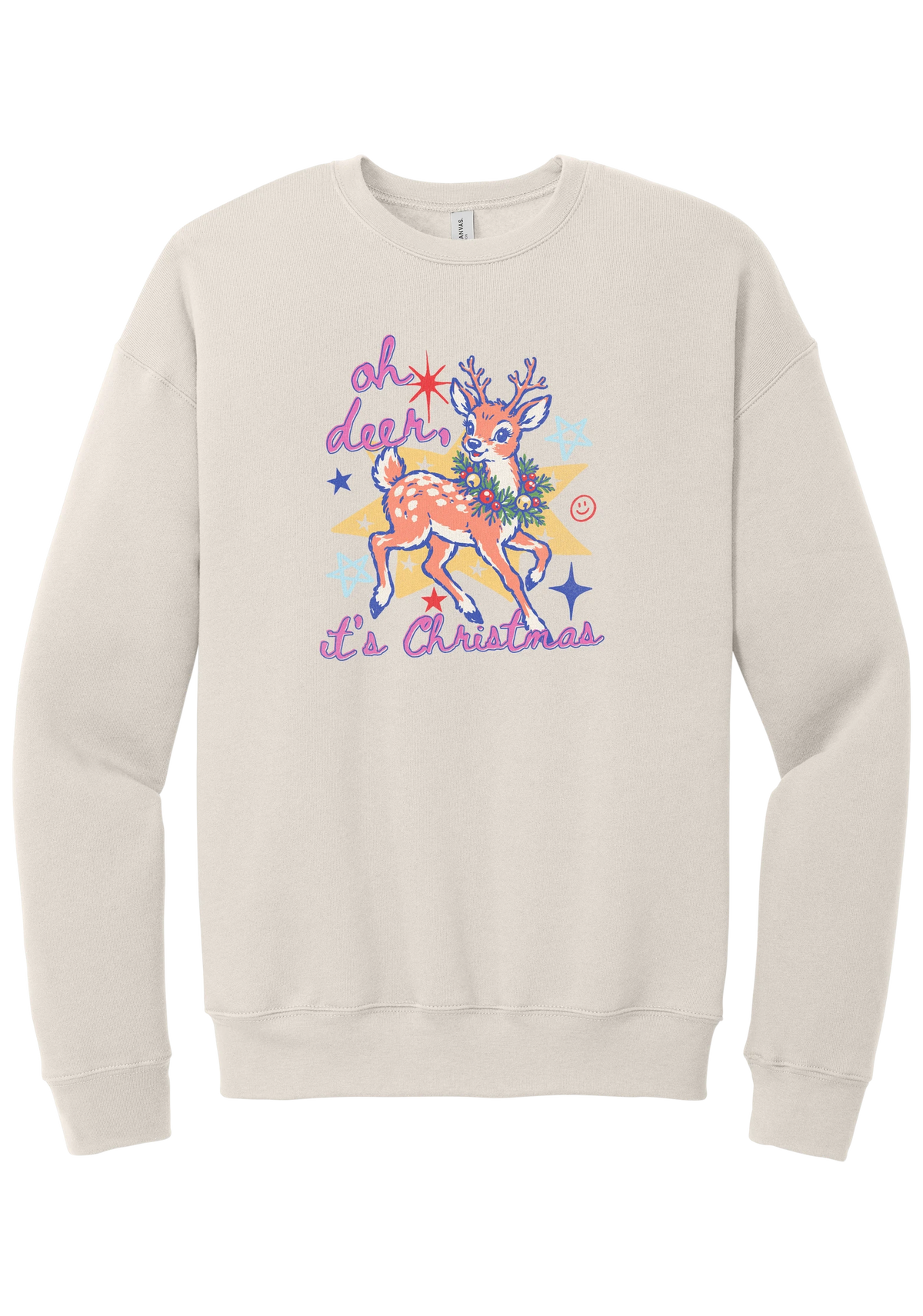 Oh Deer Retro crewneck sweatshirt in Heather Dust, featuring a retro spotted fawn with a holly wreath, pastel stars, and Oh Deer It's Christmas script
