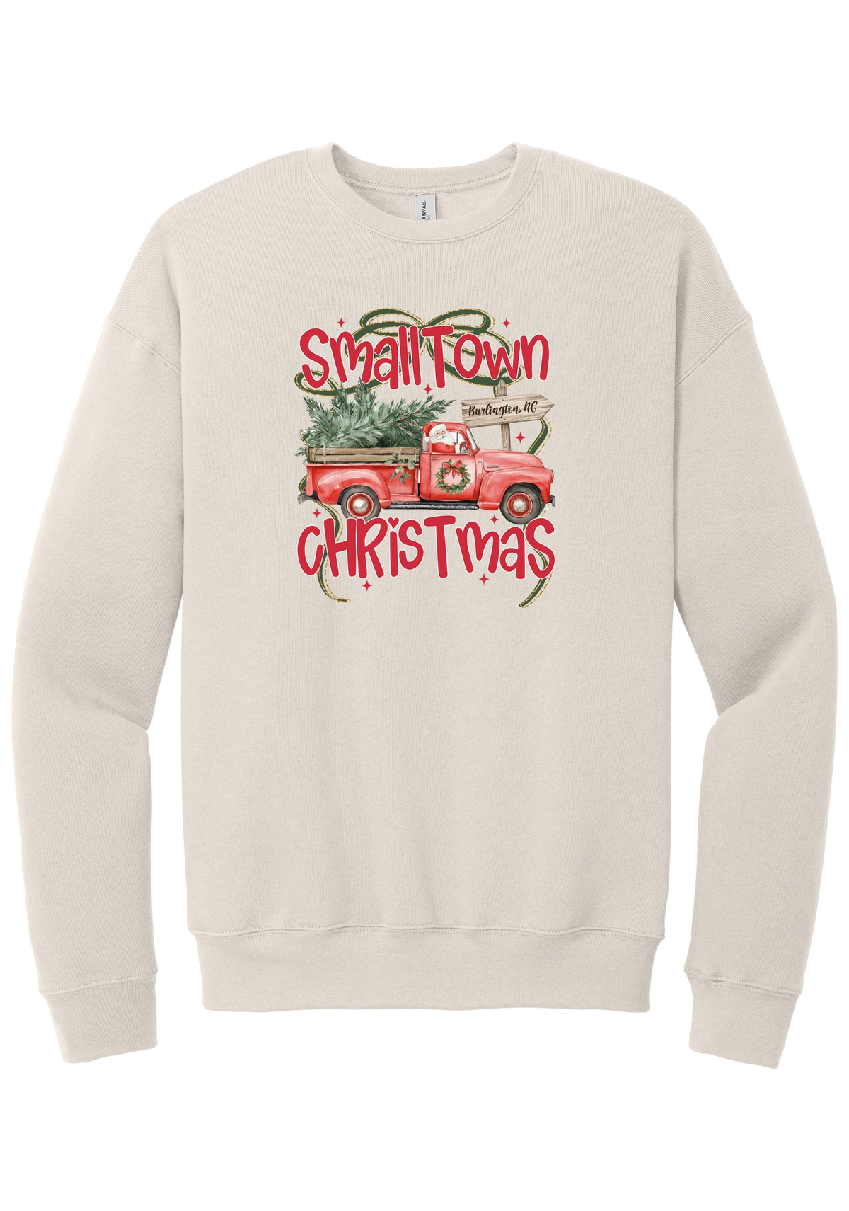 Personalized Small Town Christmas crewneck sweatshirt in Heather Dust, featuring Santa in a vintage red pickup truck hauling a Christmas tree past a personalized town road sign, with red Small Town Christmas lettering