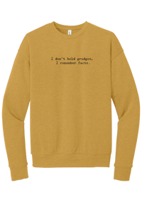 I Don't Hold Grudges crewneck sweatshirt in Heather Mustard, featuring I don't hold grudges, I remember facts in distressed black typewriter letters