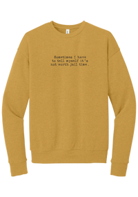 Not Worth Jail Time crewneck sweatshirt in Heather Mustard, featuring Sometimes I have to tell myself it's not worth jail time in distressed black typewriter letters