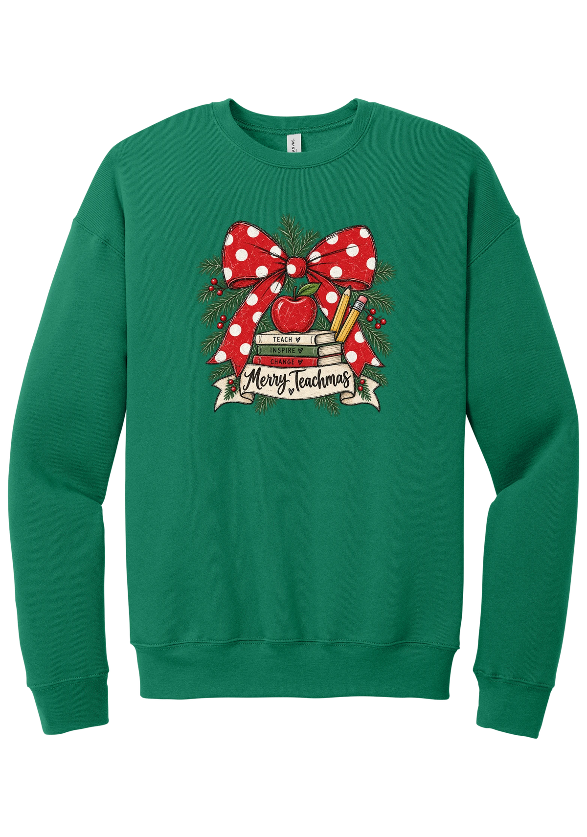 Merry Teachmas crewneck sweatshirt in Kelly Green, featuring a red polka dot bow over a stack of books reading Teach, Inspire, Change with an apple, pencils, evergreen, and a Merry Teachmas banner