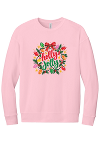 Holly Jolly Christmas Lights crewneck sweatshirt in Pink, featuring hand-lettered holly jolly script framed by vintage Christmas bulb lights, pine, holly berries, and a red bow