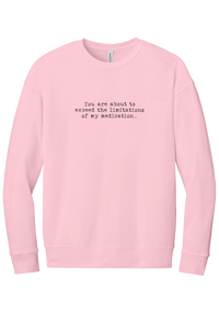 Limitations of My Medication crewneck sweatshirt in Pink, featuring You are about to exceed the limitations of my medication in distressed black typewriter letters