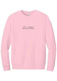 Live Laugh Leave Me Alone crewneck sweatshirt in Pink, featuring live. laugh. leave me alone. in distressed black typewriter letters
