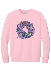 Retro Wreath crewneck sweatshirt in Pink, featuring a retro tinsel Christmas wreath with vintage ornaments and a red bow