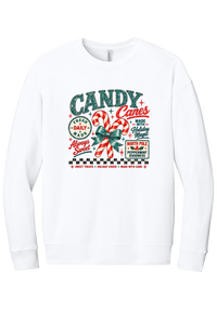 Fresh Candy Canes crewneck sweatshirt in White, featuring vintage candy shop lettering with two striped candy canes tied in a green bow, a North Pole Peppermint Goodness sign, and a checkerboard stripe