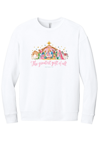 The Greatest Gift of All crewneck sweatshirt in White, featuring a pastel watercolor nativity scene under the star with The Greatest Gift of All script and Matthew 1:21