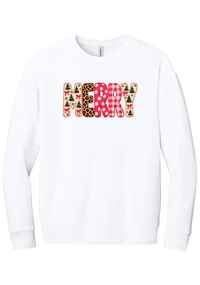 Merry Preppy Applique crewneck sweatshirt in White, featuring faux applique MERRY letters in pink and green patchwork patterns with trees, gingham, Santas, polka dots, and candy cane stripes