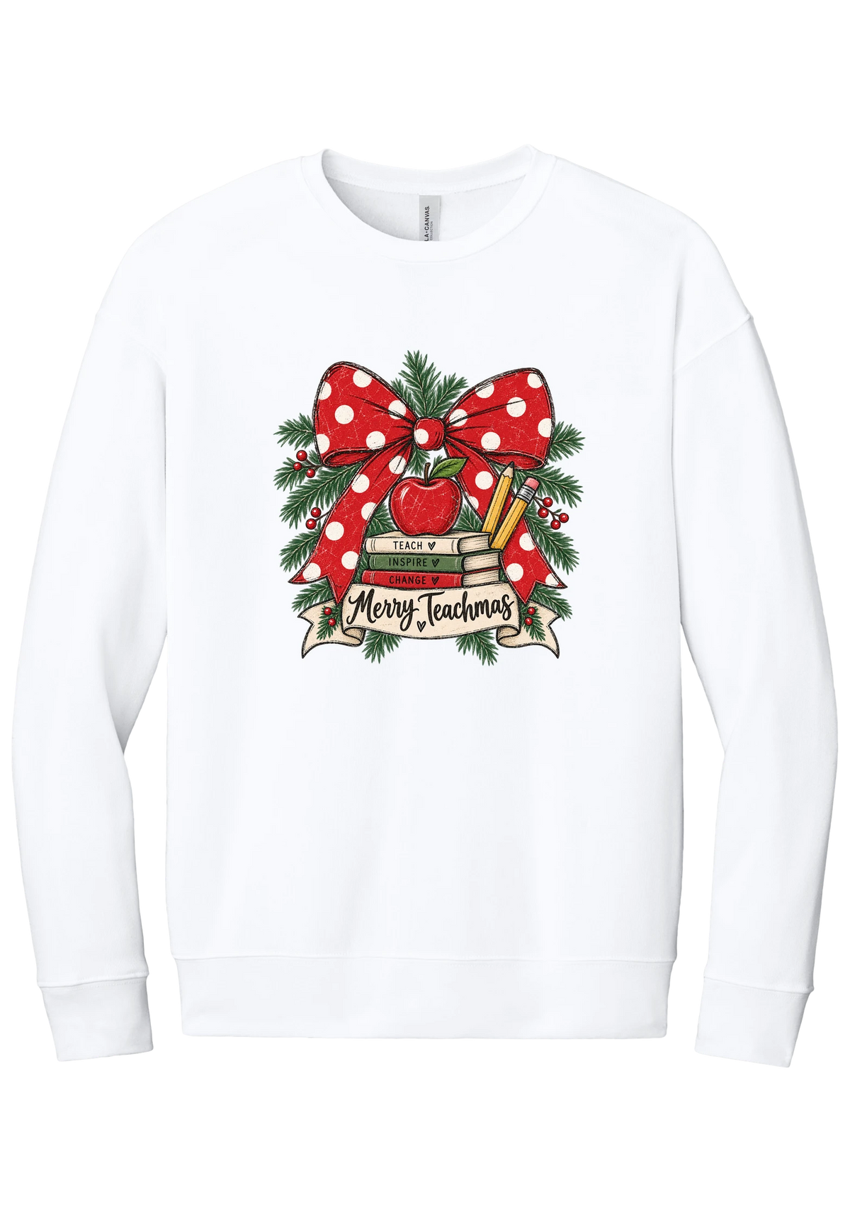 Merry Teachmas crewneck sweatshirt in White, featuring a red polka dot bow over a stack of books reading Teach, Inspire, Change with an apple, pencils, evergreen, and a Merry Teachmas banner