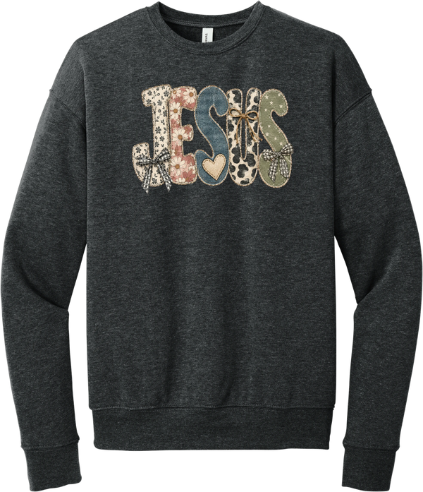 Jesus Patchwork crewneck sweatshirt in Dark Grey Heather, featuring JESUS in patchwork letters of floral, leopard, denim, and cow print with gingham bows and a heart