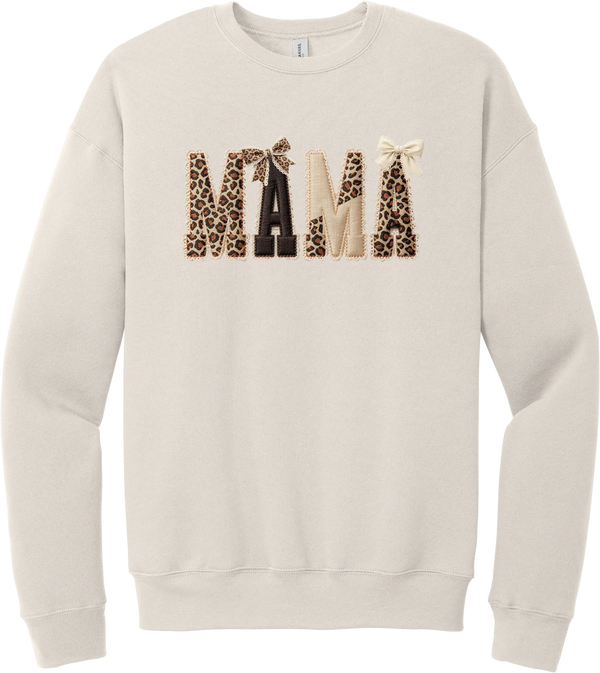 Mama Leopard Applique crewneck sweatshirt in Heather Dust, featuring MAMA spelled out in leopard, cream, and chocolate patches with a scalloped stitched applique look and two bows