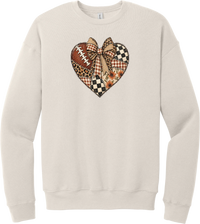 For the Love of Football crewneck sweatshirt in Heather Dust, featuring a patchwork heart in leopard, plaid, and checkerboard with a football and a cream bow