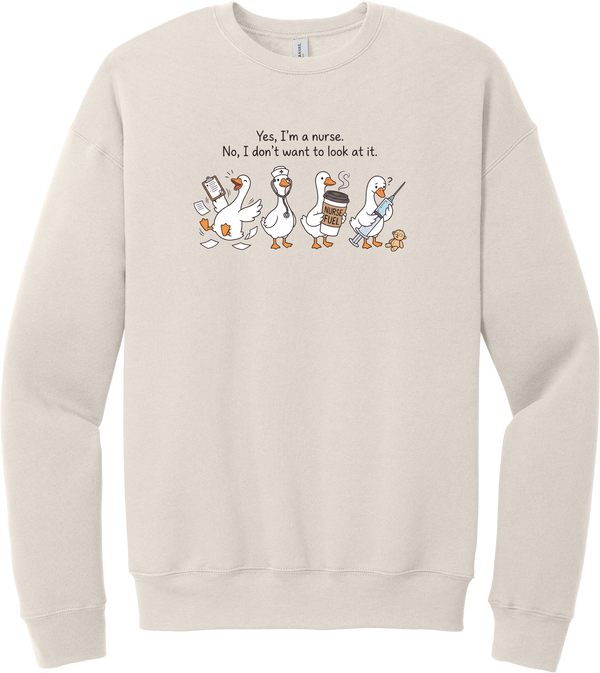 Yes I'm a Nurse Goose crewneck sweatshirt in Heather Dust, featuring four nurse geese with a clipboard, stethoscope, coffee, and needle under Yes, I'm a nurse. No, I don't want to look at it.