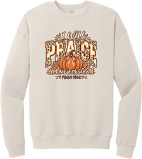 Praise Him Pumpkin crewneck sweatshirt in Heather Dust, featuring I Will Praise Him in Every Season in leopard varsity letters with a pumpkin, a pink bow, and Psalm 146:2