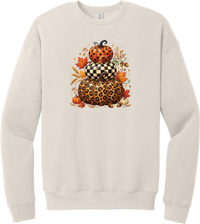 All Stacked Up crewneck sweatshirt in Heather Dust, featuring three stacked pumpkins in polka dot, checkerboard, and leopard with autumn leaves