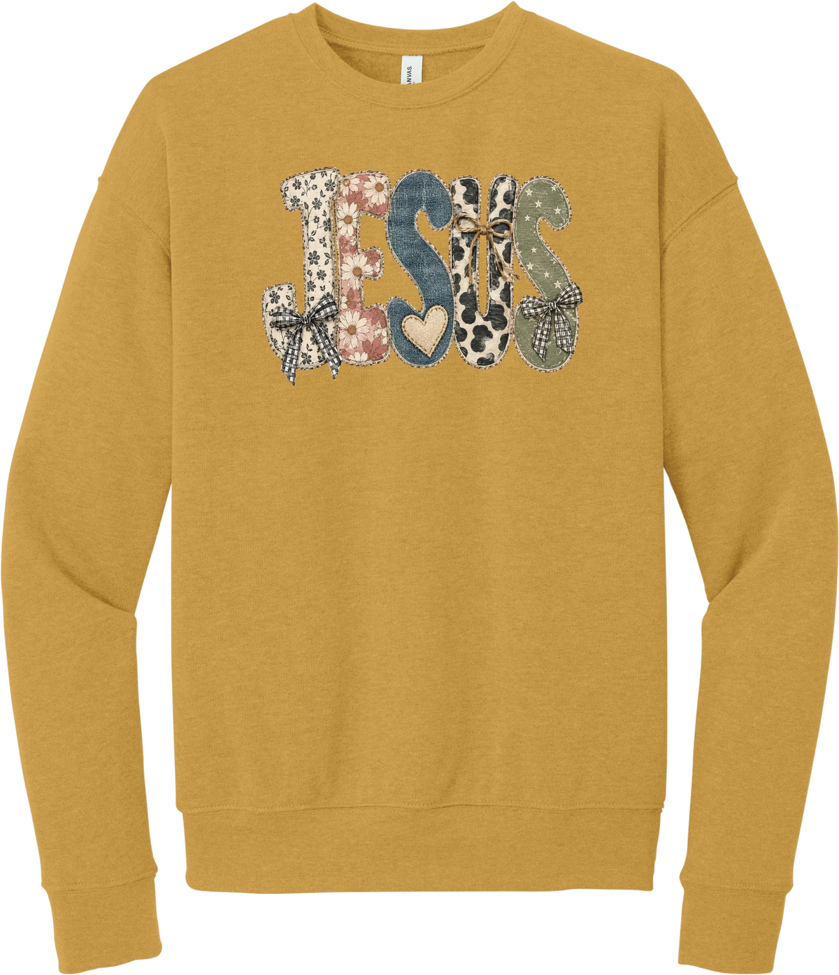Jesus Patchwork crewneck sweatshirt in Heather Mustard, featuring JESUS in patchwork letters of floral, leopard, denim, and cow print with gingham bows and a heart