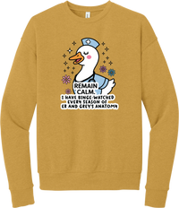 Remain Calm Nurse crewneck sweatshirt in Heather Mustard, featuring a nurse goose in a cap with sparkles and flowers above Remain Calm lettering