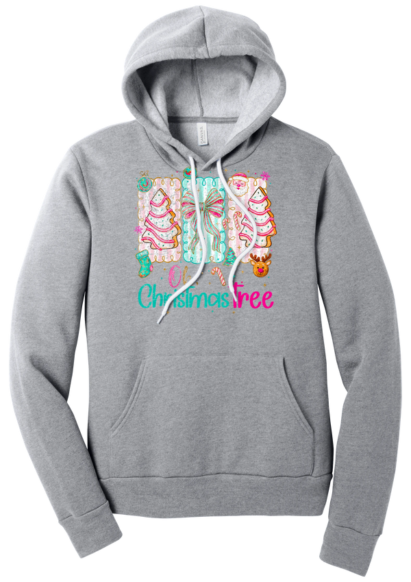 Oh Christmas Tree Cakes hoodie in Athletic Heather, featuring frosted Christmas tree snack cakes on pink and mint panels over Oh Christmas Tree lettering