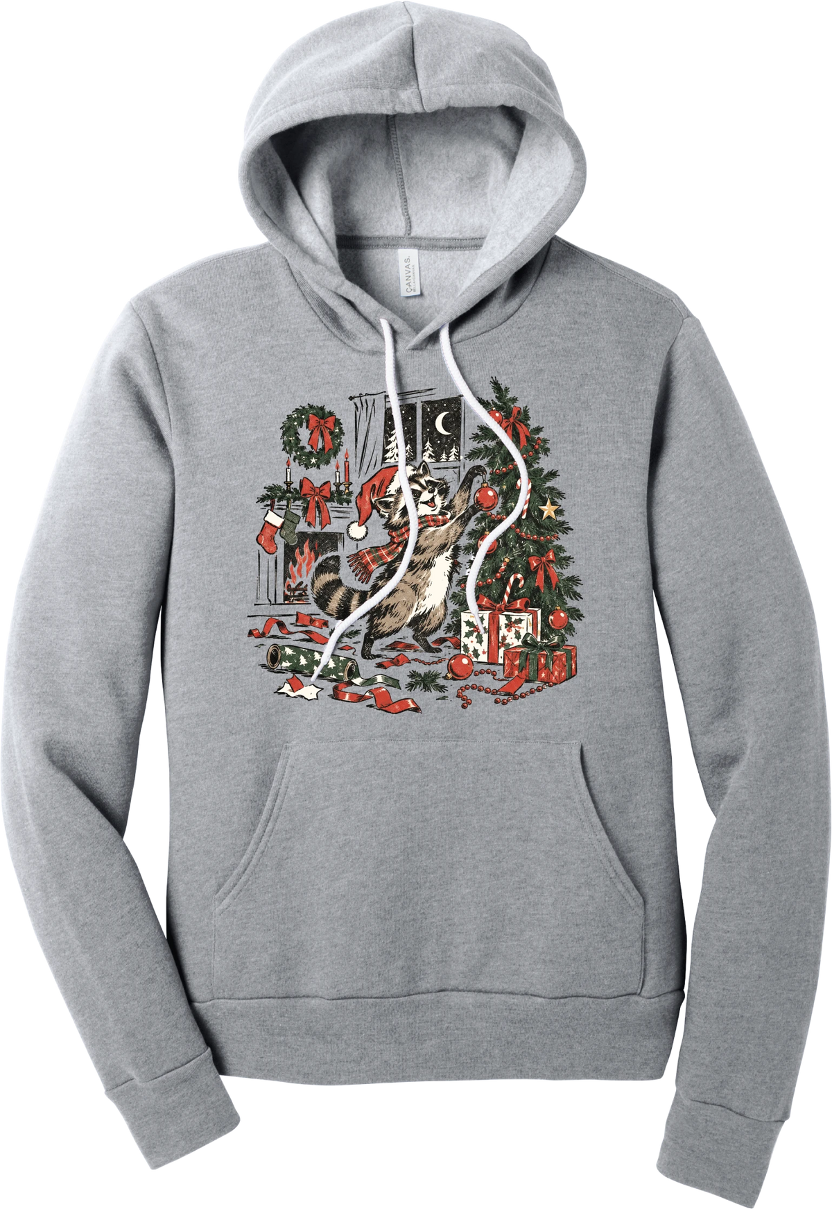 Raccoon Christmas hoodie in Athletic Heather, featuring a vintage-style raccoon in a Santa hat and plaid scarf decorating a Christmas tree by the fireplace with ribbon and gifts scattered around
