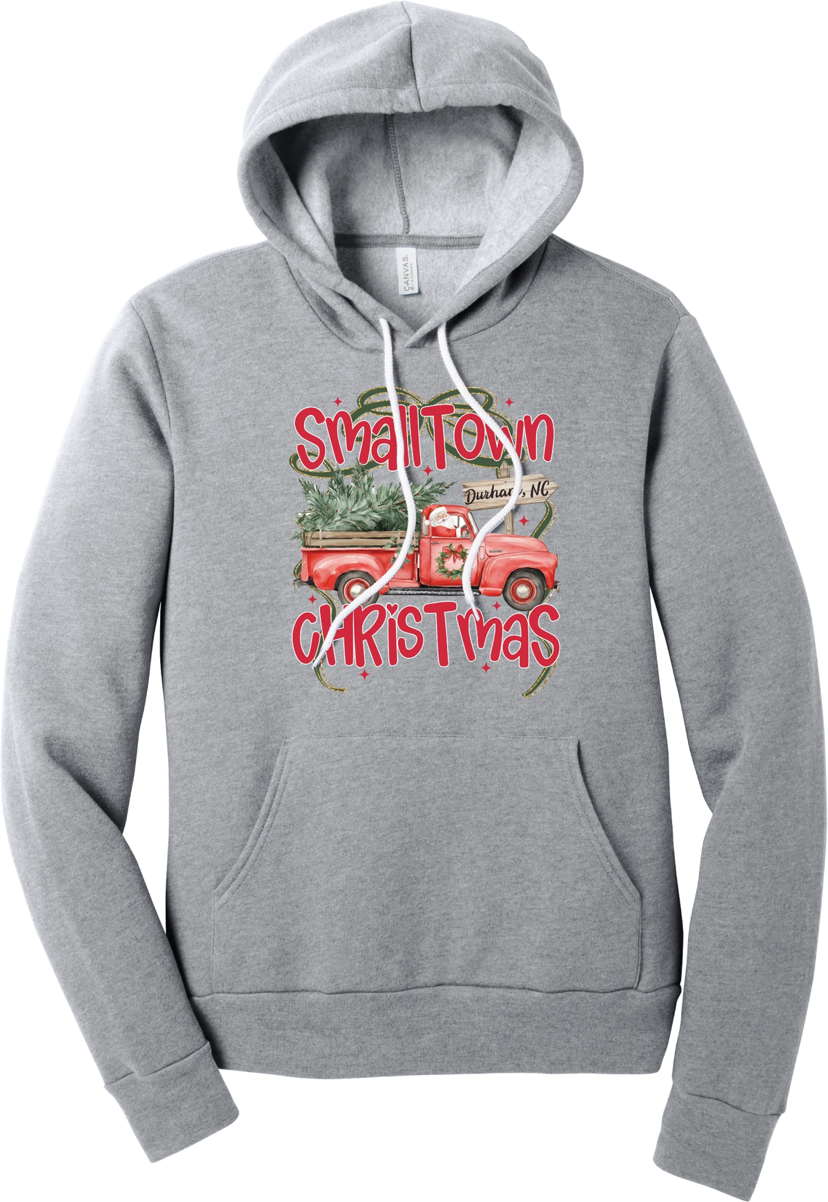 Personalized Small Town Christmas hoodie in Athletic Heather, featuring Santa in a vintage red pickup truck hauling a Christmas tree past a personalized town road sign, with red Small Town Christmas lettering