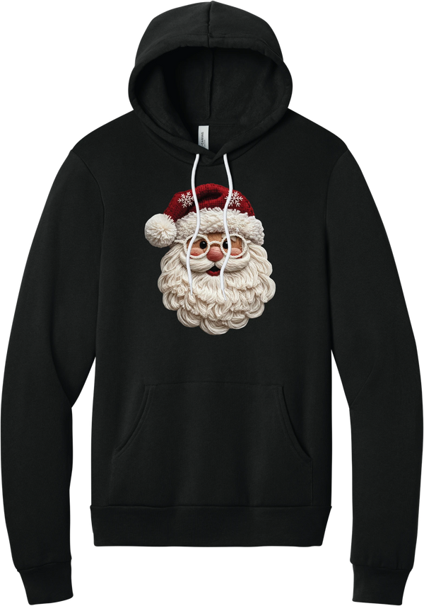 Crocheted Santa hoodie in Black, featuring a yarn-textured Santa face with a chunky cream beard, round glasses, and a red knit hat with snowflakes and a pom-pom