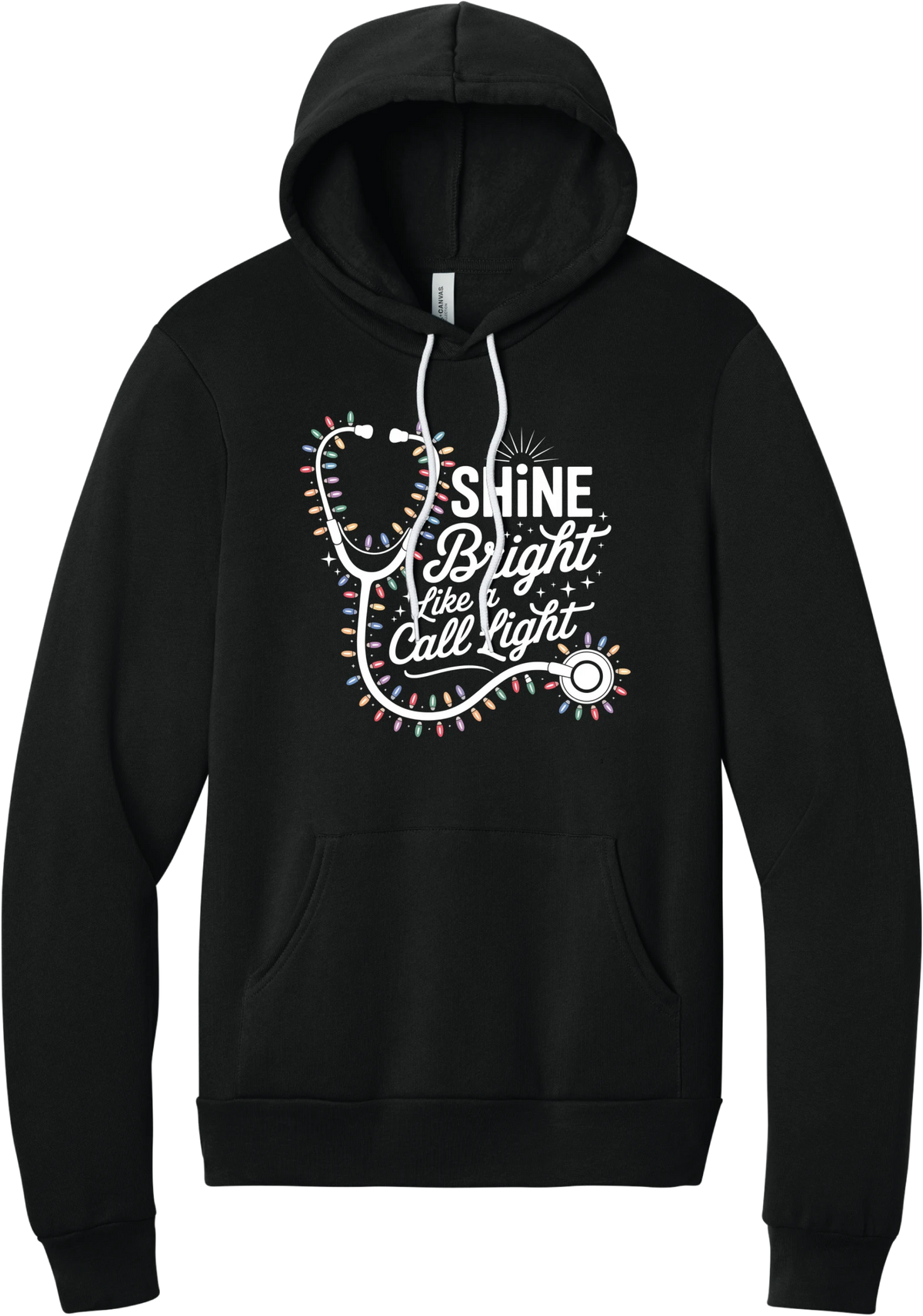 Shine Bright Like a Call Light hoodie in Black, featuring a white stethoscope wrapped in multicolor Christmas lights with Shine Bright Like a Call Light lettering and sparkles