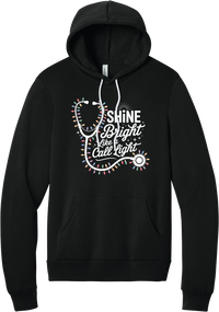 Shine Bright Like a Call Light hoodie in Black, featuring a white stethoscope wrapped in multicolor Christmas lights with Shine Bright Like a Call Light lettering and sparkles