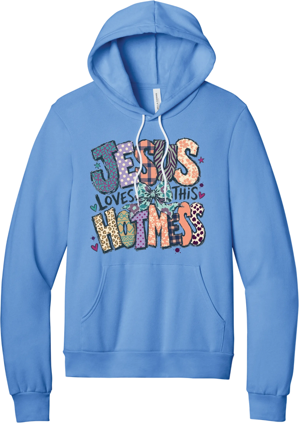 Jesus Loves This Hot Mess hoodie in Carolina Blue, featuring patchwork Jesus Loves This Hot Mess lettering in leopard, plaid, polka dot, and zebra prints with a bow and hearts
