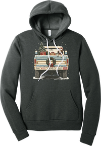 Christmas Pickup Truck with Dog hoodie in Dark Grey Heather, featuring a vintage pickup truck with a Christmas tree, wrapped gifts, a tailgate wreath, and a dog in a Santa hat