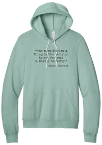 Amelia Earhart Tenacity Quote hoodie in Dusty Blue, featuring The most difficult thing is the decision to act the rest is merely tenacity in distressed black typewriter letters
