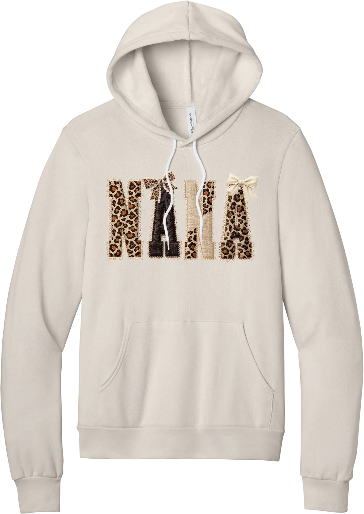 Grandma Leopard Applique hoodie in Heather Dust, featuring NANA spelled out in leopard, cream, and chocolate patches with a scalloped stitched applique look and two bows