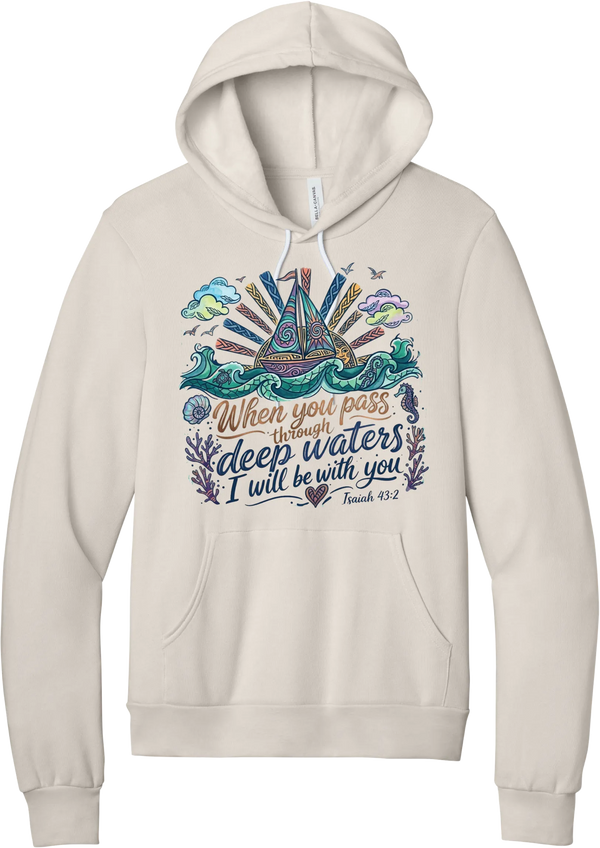 Deep Waters Folk Art hoodie in Heather Dust, featuring a folk art sailboat on swirling waves with a sunburst, seashells, and a seahorse above When You Pass Through Deep Waters I Will Be With You lettering and Isaiah 43:2
